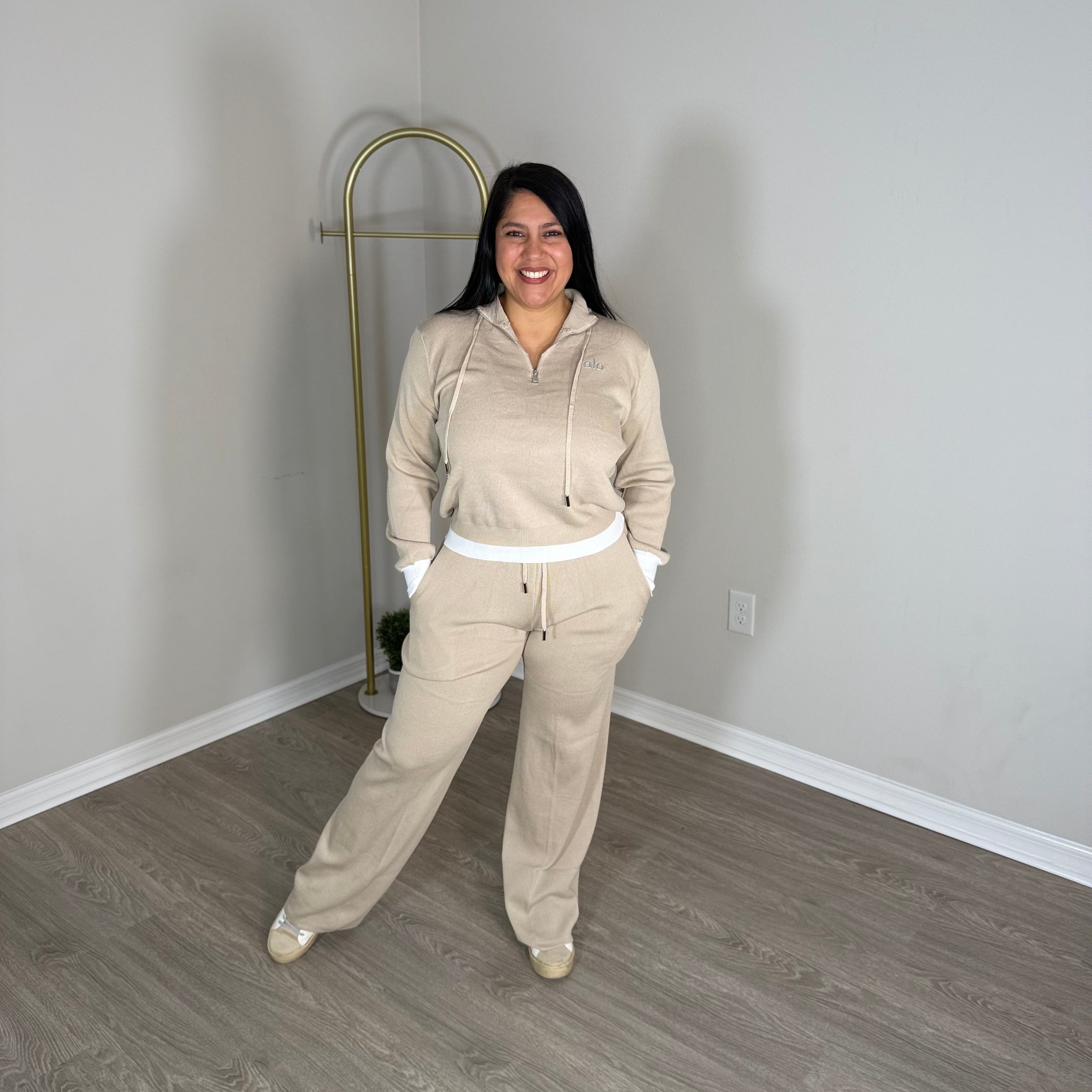 Cream two-piece set with shiny brown details.